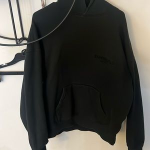 Black essentials hoodie with suede lettering